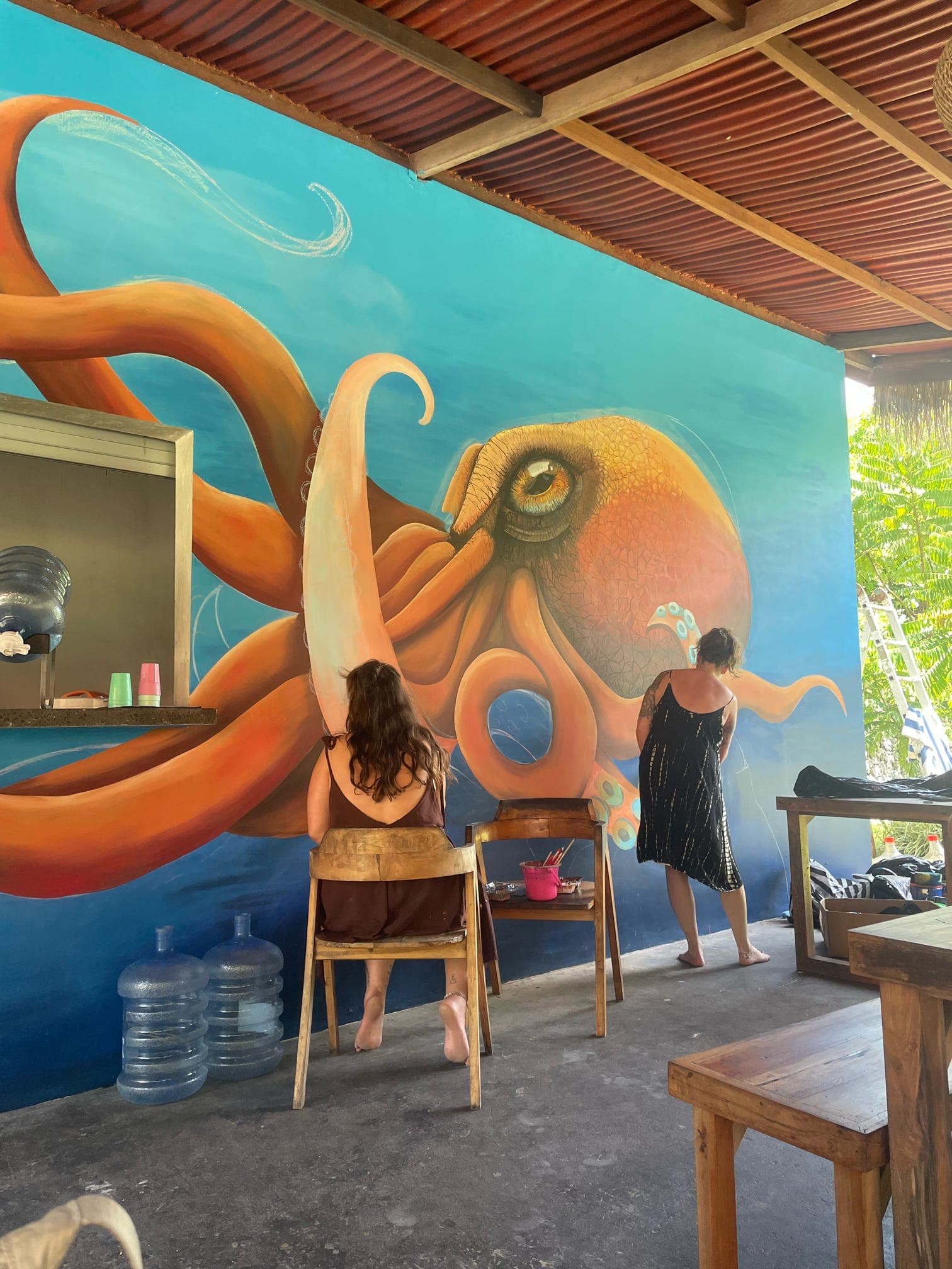 Our amazing guest artists - Ciara and Katie painting an octopus mural