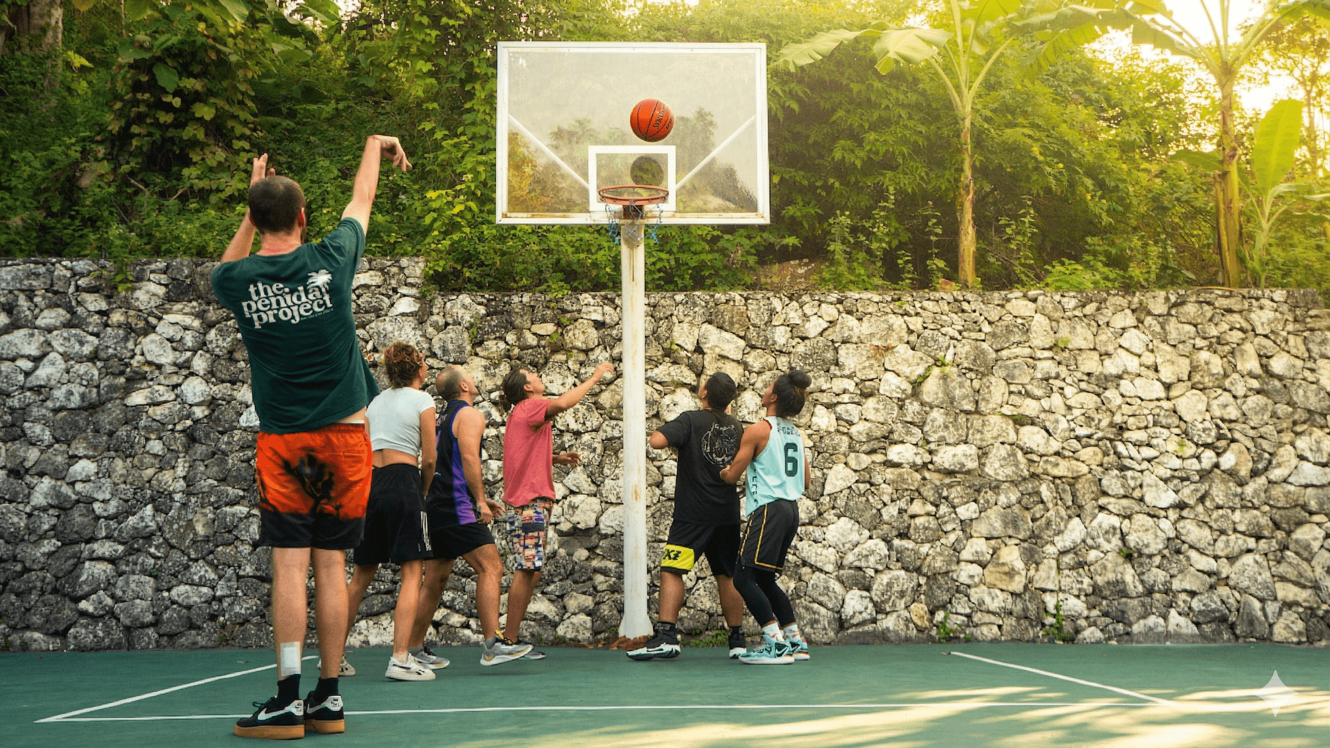 Group basketball game on our tropical court