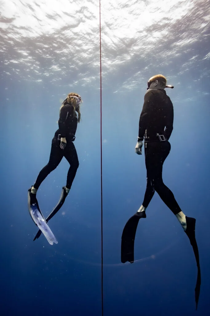 Freediver underwater in clear Nusa Penida water