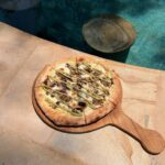 Funghi mushroom pizza with garlic oil, mozzarella, parmesan and pesto mayo in Nusa Penida.